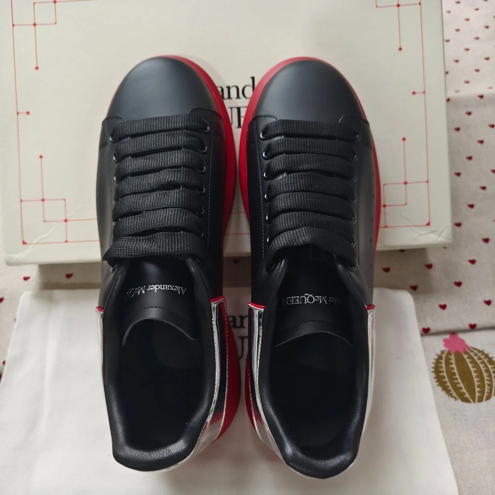 Alexander McQueen Black Leather Sneakers with Red Soles